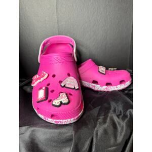 Barbie x Crocs Classic Clogs in "Electric Pink".
